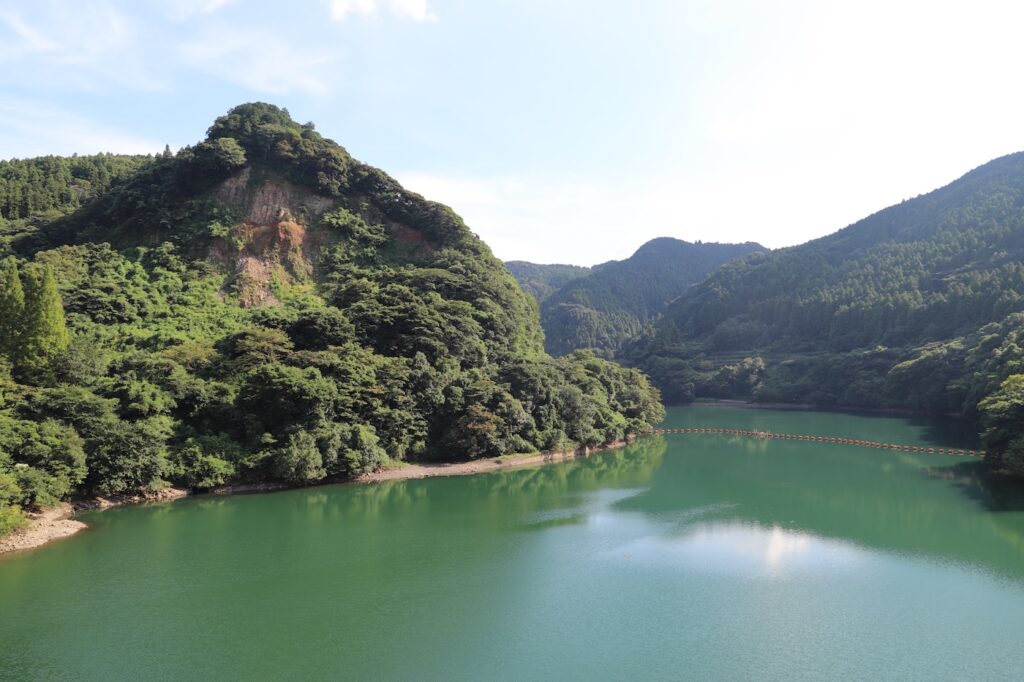Mountain landscape with a calm green lake