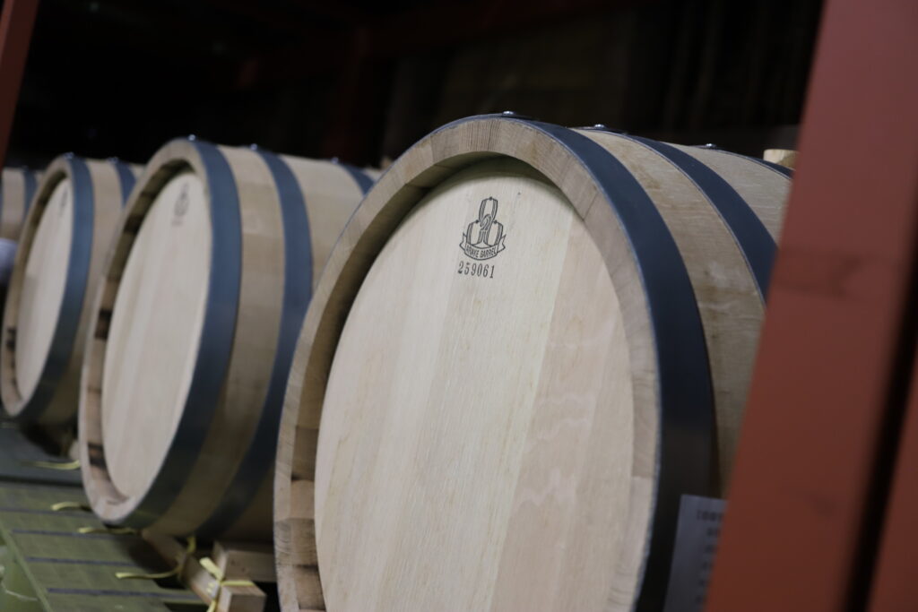 Wooden barrels used for aging craft gin at Mitsutake Brewery in Kashima, Saga.